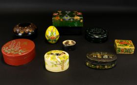 A Collection of Papier Mache Trinket Boxes Including black lacquered elephant hand painted box,