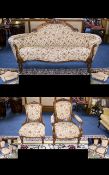 A Large Chaise Lounge Generous two seater chaise sofa with carved detail to arm and head rest.