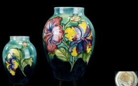 William Moorcroft Signed Tube lined Vase ' Hibiscus ' Design. c. Early 1940's.