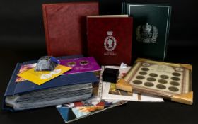 A Collection Of Modern Commemorative Coins And Stamps To include the Royal Wedding Coin Collection