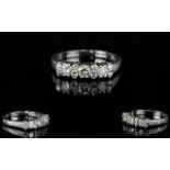 18ct White Gold Channel Set Diamond Dress Ring.