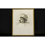 A Vintage Photographic Portrait Of Female Infant Framed and mounted under glass,