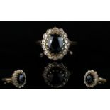 Ladies 9ct Yellow Gold Set Sapphire and Diamond Cluster Ring.