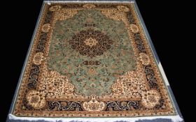 A Very Large Woven Silk Carpet Keshan rug with Eau De Nil ground and traditional Middle Eastern