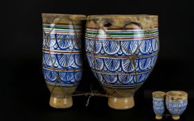 Decorative Ceramic Bongo Drums Conjoined drums with hand painted ceramic barrel and animal hide