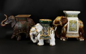 Three Elephant Themed Plant Stands Two glazed Majolica style stands in the form of Elephants with