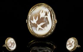 A Vintage 9ct Gold Set Shell Cameo Dress Ring. Fully Hallmarked. The Cameo Depicting Flying Birds.
