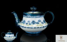 James Macintyre Florian Ware Small Teapot. c.1905, Blue Violets on White Ground. Reg No 401753. 3.