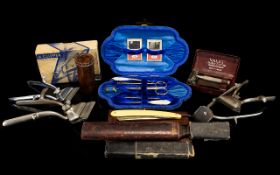 A Collection Of Vintage Vanity Items To include cased manicure set, several pairs of clippers,