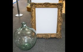 Large Green Tinted Clear Demi John / Carboy, height 22 Inches. Together With A Gilt Picture Frame.