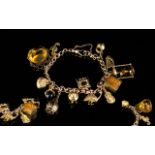 Antique Period 9ct Rose Gold Bracelet loaded with thirteen 9ct gold charms of nice quality.