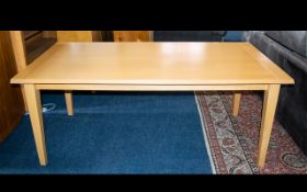 A Large Pine Dining Table Contemporary rectangular dining table of plain form, good condition.