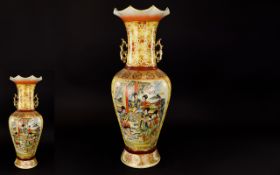 A Large Reproduction Oriental Vase Tall Satsuma style vase with fluted neck, gilt handles and