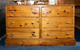 Pine Chest Of Drawers Comprising six drawers with plinth base, height 30 inches, width 51 inches.