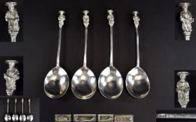 18th Century Matched Set of Four Silver Spoons with Later Attached White Metal Figural Finials. (The