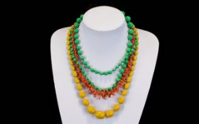 A Collection Of Three Vintage Necklaces Each in good condition to include extra long 1930's green