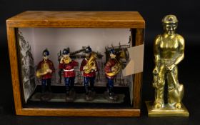 A Vintage Cased Display Of Figures Wood case with sliding glass door insert containing four models