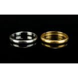 18ct Yellow Gold Wedding Band + 18ct White Gold Wedding Band. Both Rings Fully Hallmarked for 18ct.