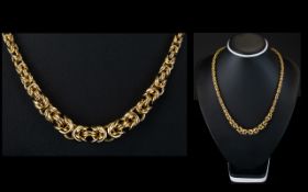 A Superb Quality Graduated 9ct Gold Necklace In a Byzantine Design. Fully Hallmarked.