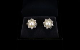 18ct White Gold - Pair of Nice Quality Diamond and Pearl Set Earrings.