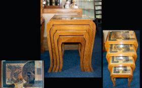 Nest Of Oriental Carved Tables Four occasional tables with exaggerated legs and carved detail to