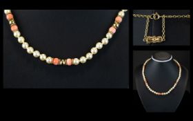 Ladies Coral and Pearl ( Cultured ) Necklace / Collar. Set with 9ct Gold Spacers and Clasp.
