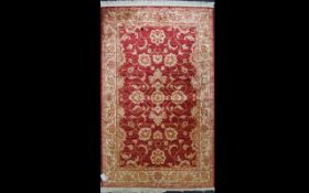 A Large Woven Silk Carpet Large Zeigler carpet, red ground with repeated red floral and foliate