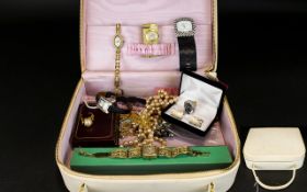 A Vintage Vanity Case Containing A Small Collection Of Costume Jewellery 1970's cream vinyl top