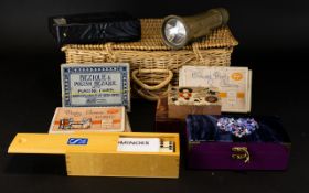 A Whicker Basket containing assorted games and collectables.