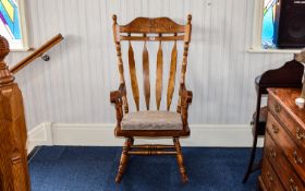 American, Wooden, Early 19th Century Ladderback Armless Rocking Chair with Woven Rush Seat. In