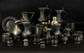 A Collection of Pewter comprising tankards, a cocktail shaker, tankards, jugs and measures.