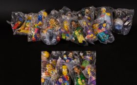 A Collection of Approximately 14 Simpson Toys.