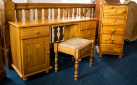 Pine Dressing Table Comprising a pedestal of four drawers together with cupboard and single drawer.