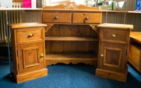 A Pair Of Pine Bedside Cabinets Comprising single drawer and cupboard.