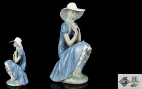 Nao by Lladro Porcelain Figurine ' Young Girl ' In Summer Dress and Hat. Seated.