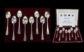 Elizabeth II Complete Set of ( 8 ) Eight Reproductions of Picture Back Sterling Silver Teaspoons.