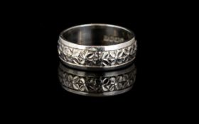 18ct White Gold Wedding Band with Flower Decoration. Fully Hallmarked for 18ct Gold. Ring Size - M.