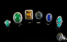 Silver And Stone Set Rings A collection of six handmade silver rings each set with natural stones.