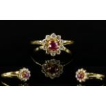 18ct Gold Ruby and CZ Set Cluster Ring.