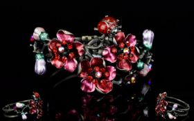 A Floral And Crystal Set Statement Cuff