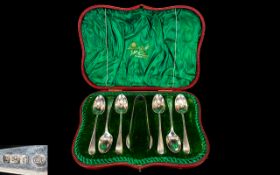 Victorian Period Boxed Set of Six Silver Teaspoons and Matching Sugar Nips.