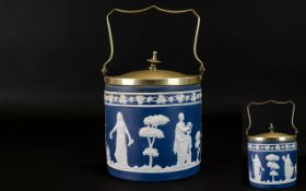 Jasper Ware Blue and White Biscuit Barrel with silver plated lid and handle.
