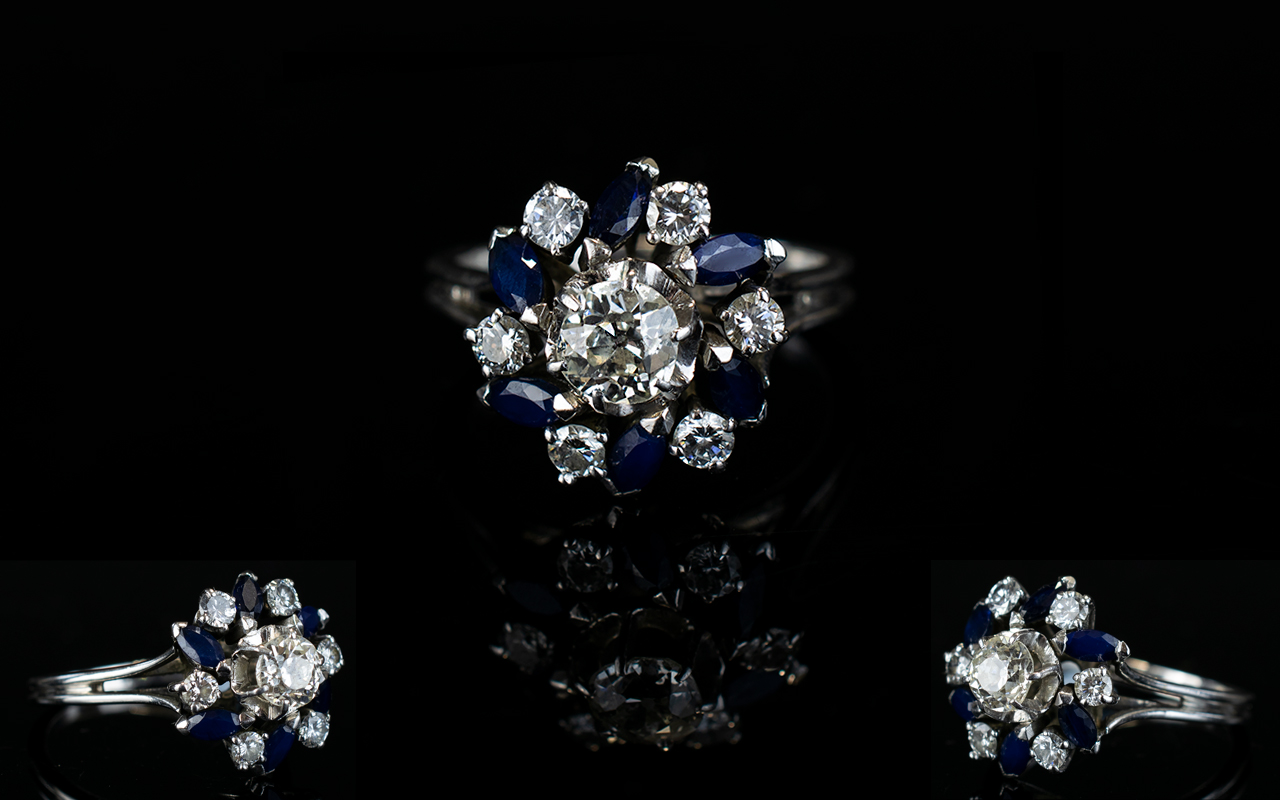 18ct White Gold Diamond and Sapphire Dress Ring, In a Flower head Design Setting.
