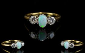 18ct Gold - Superb Quality Opal and Diamond Dress Ring.