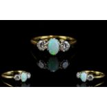 18ct Gold - Superb Quality Opal and Diamond Dress Ring.