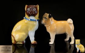 Germany - 19th Century Porcelain Pug Dog Figure, with Blue Collar and Bells to Neck.