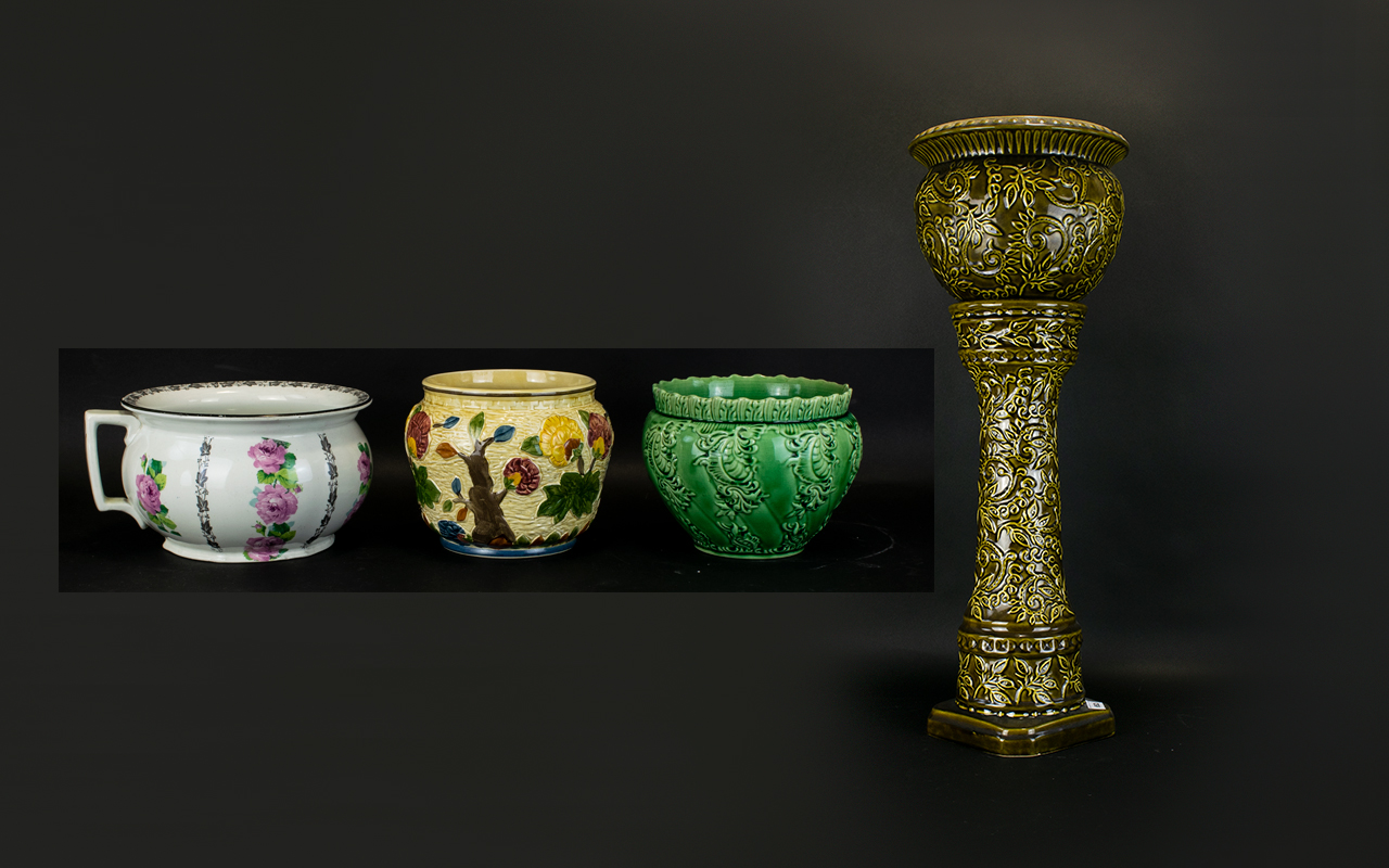 Green Moulded Glazed Jardiniere and Stand.