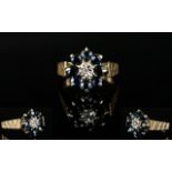 Ladies - 1970's 9ct Yellow Gold Sapphire and Diamond Set Dress Ring. Flower head Design.