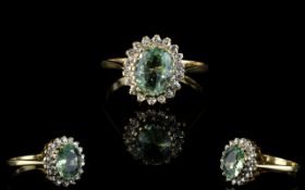 Ladies Attractive 9ct Gold Aquamarine And Diamond Set Cluster Ring.