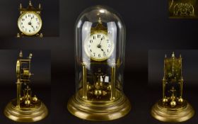 Antique Period Anniversary - 400 Day Brass Clock and Glass Dome. Features White Porcelain Dial, of